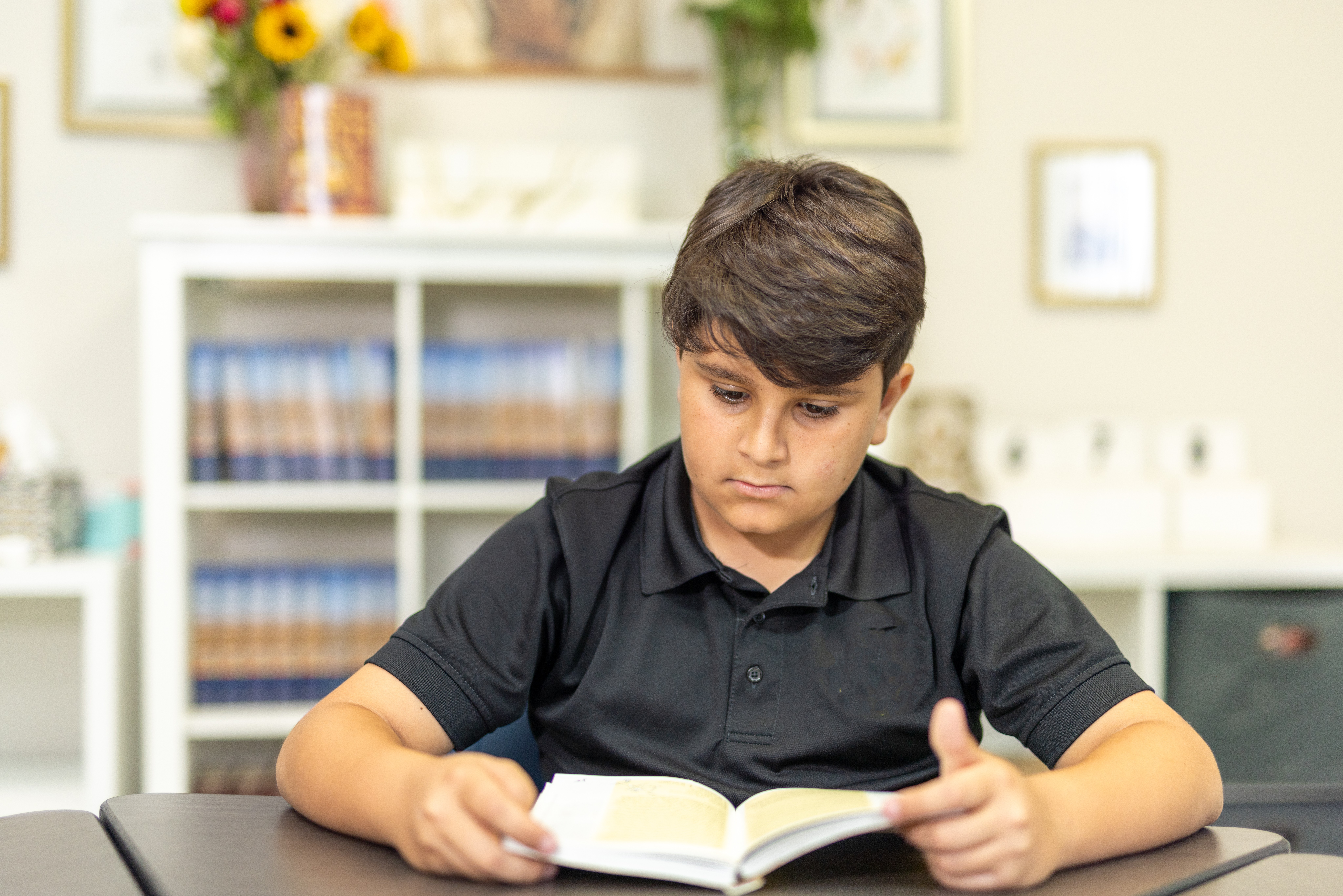 Boy reading a book